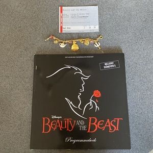 Authentic Disney Beauty and the Beast charm bracelet.